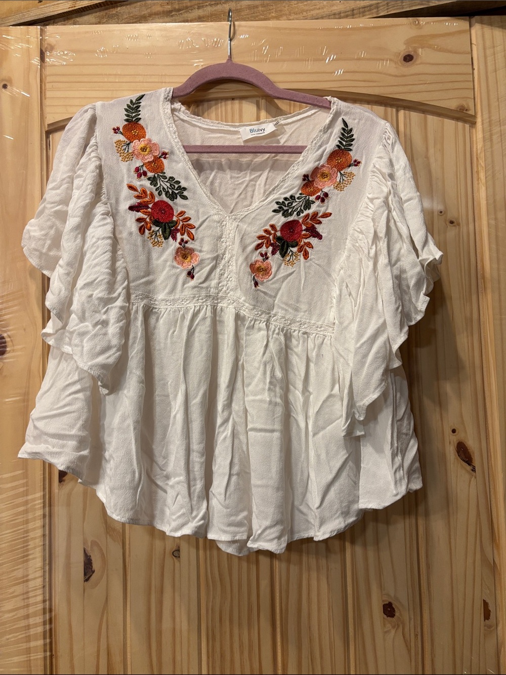 White Embroidered V-Neck Women's Top with Floral Detail